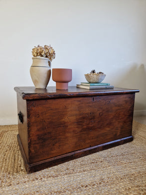 antique wooden chest displayed with rustic vase and bowl, 2 green and brown books with bowl on top