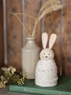 Handmade wooden bunny, body of bunny has been wrapped in cream wool for added texture.
